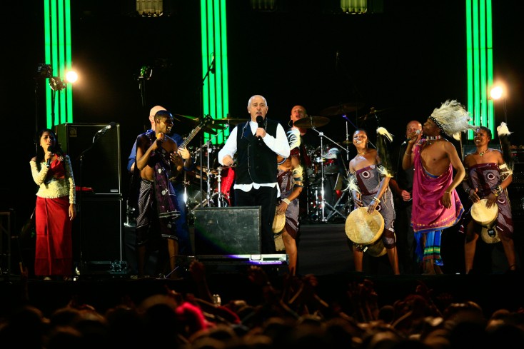 Peter on stage with The Zawose Family and Ouch Savy at WOMAD 2007